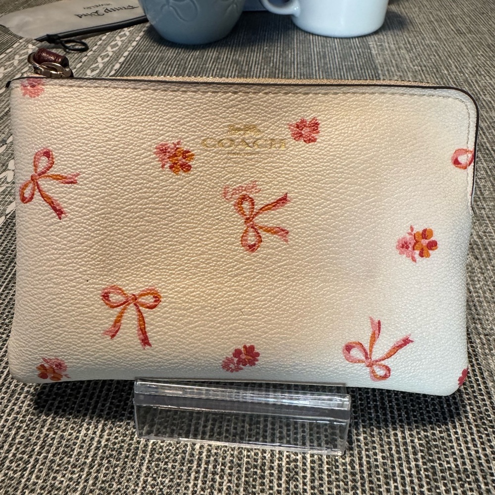 Coach Cream Wristlet with Pink Floral Design
